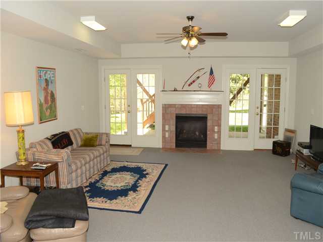 5412 Earle Road Raleigh, NC 27606 - Photo 20 of 25 One View of HUGE Finished Room in Basement. Front is underground, Rear is Walk-out. There is also a large unfinished area for Storage.
