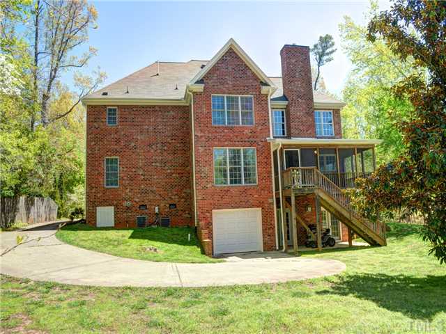 Back of Home. Note Concrete Driveway to Garage in Rear
