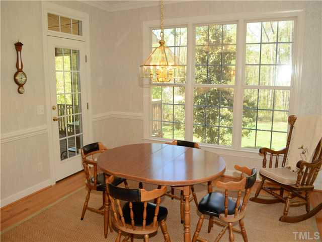 5412 Earle Road Raleigh, NC 27606 - Photo 10 of 25 Breakfast Nook with Door to Screened Porch