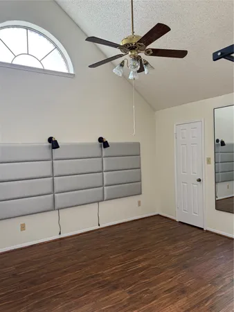 a bathroom with a toilet and a bathtub
