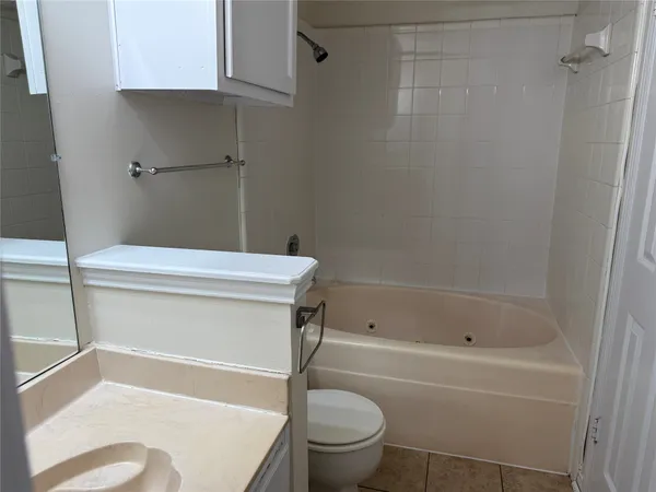 a view of a building with a tree