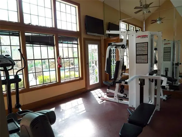 a view of a swimming pool with a yard