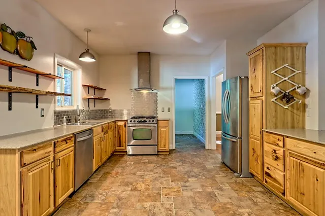 a view of porch with wooden floor and floor to ceiling window