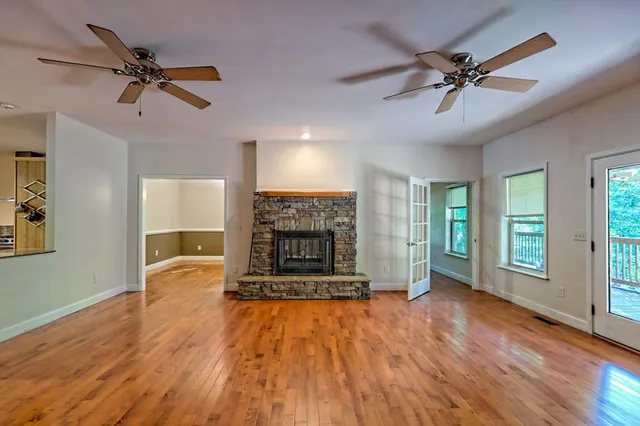 a bathroom with a toilet a sink and a mirror