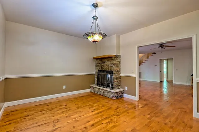 a room with furniture and a large window