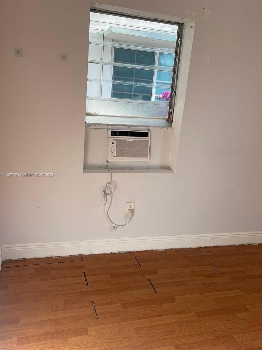 7928 Harding Avenue, Unit 1 Miami Beach, FL 33141 - Photo 17 of 17 a bathroom with a sink