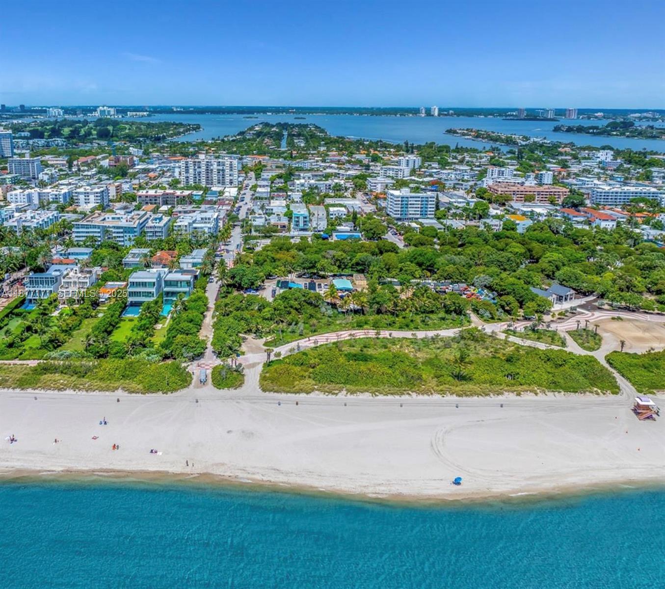 7928 Harding Avenue, Unit 1 Miami Beach, FL 33141 - Photo 5 of 17 an aerial view of residential houses with outdoor space and trees
