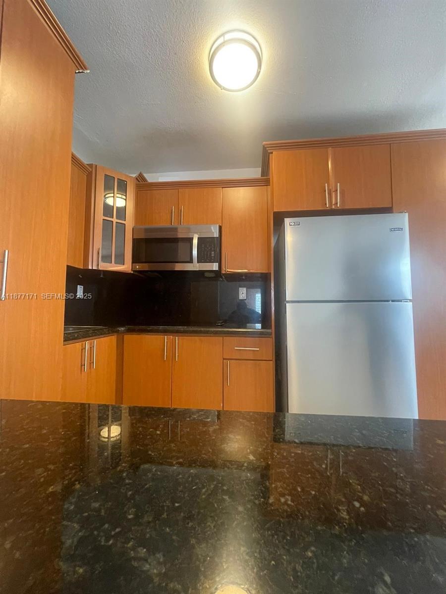7928 Harding Avenue, Unit 1 Miami Beach, FL 33141 - Photo 9 of 17 a view of entryway with a hall