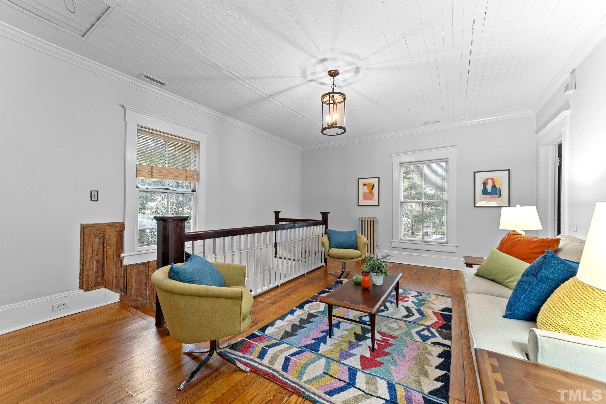 801 Onslow Street Durham, NC 27705 - Photo 20 of 30 a living room with furniture and wooden floor