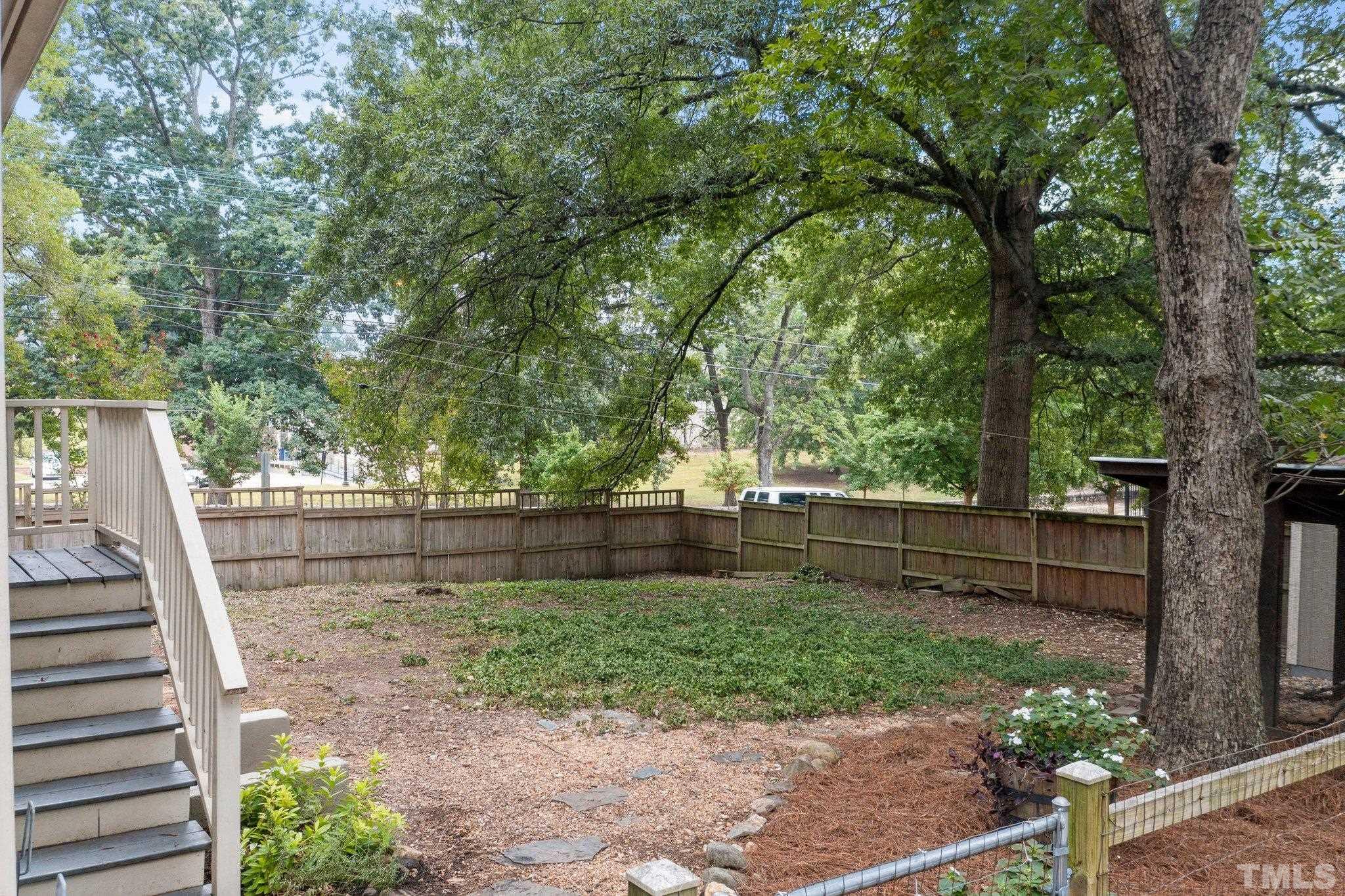 801 Onslow Street Durham, NC 27705 - Photo 27 of 30 a view of a backyard with trees