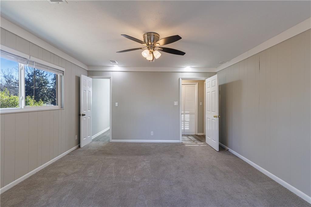 779 Amber Place Northwest Atlanta, GA 30331 - Photo 22 of 35 a view of an empty room with a window