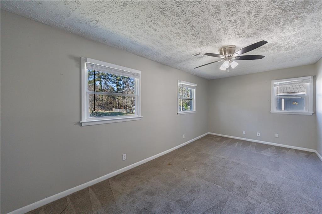 779 Amber Place Northwest Atlanta, GA 30331 - Photo 30 of 35 an empty room with a window