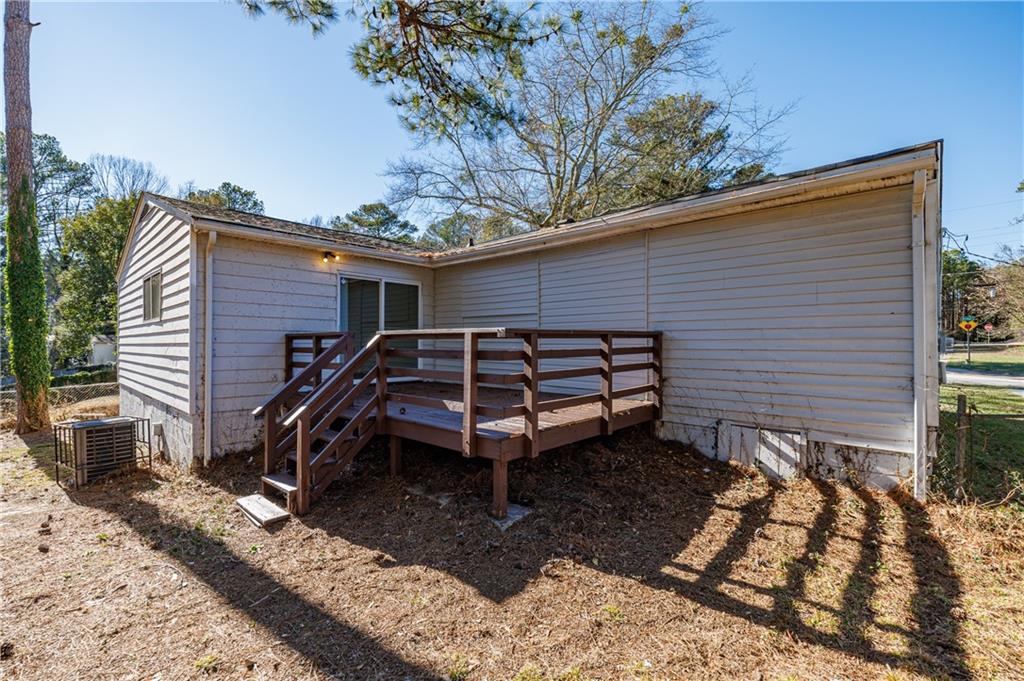779 Amber Place Northwest Atlanta, GA 30331 - Photo 5 of 35 a view of a house with a bed and wooden roof