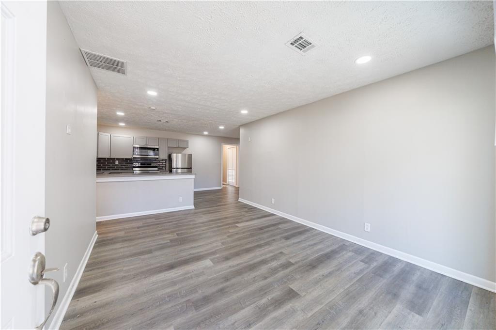 779 Amber Place Northwest Atlanta, GA 30331 - Photo 8 of 35 a view of kitchen with wooden floor
