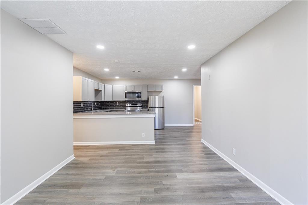 779 Amber Place Northwest Atlanta, GA 30331 - Photo 9 of 35 a view of kitchen with wooden floor
