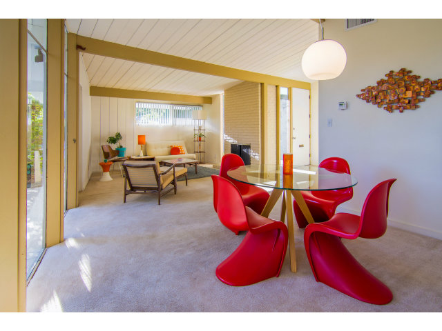 795 Greer Road Palo Alto, CA 94303 - Photo 2 of 9 a living room with furniture toys and a large window