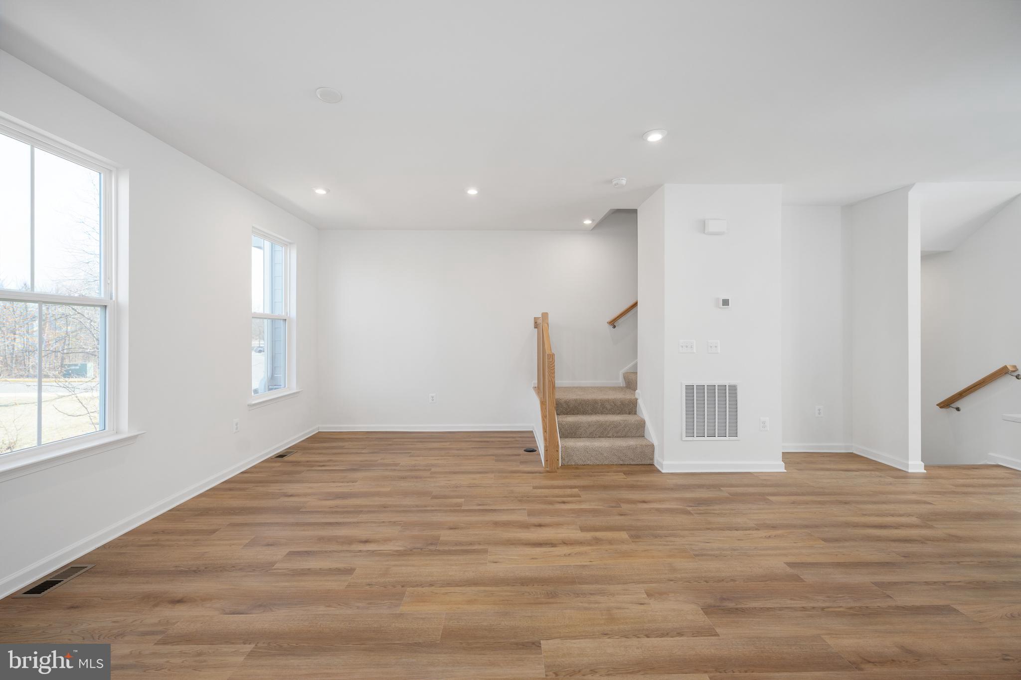 10165 Queens Way Manassas, VA 20110 - Photo 4 of 27 Family Room - Color Package Varies