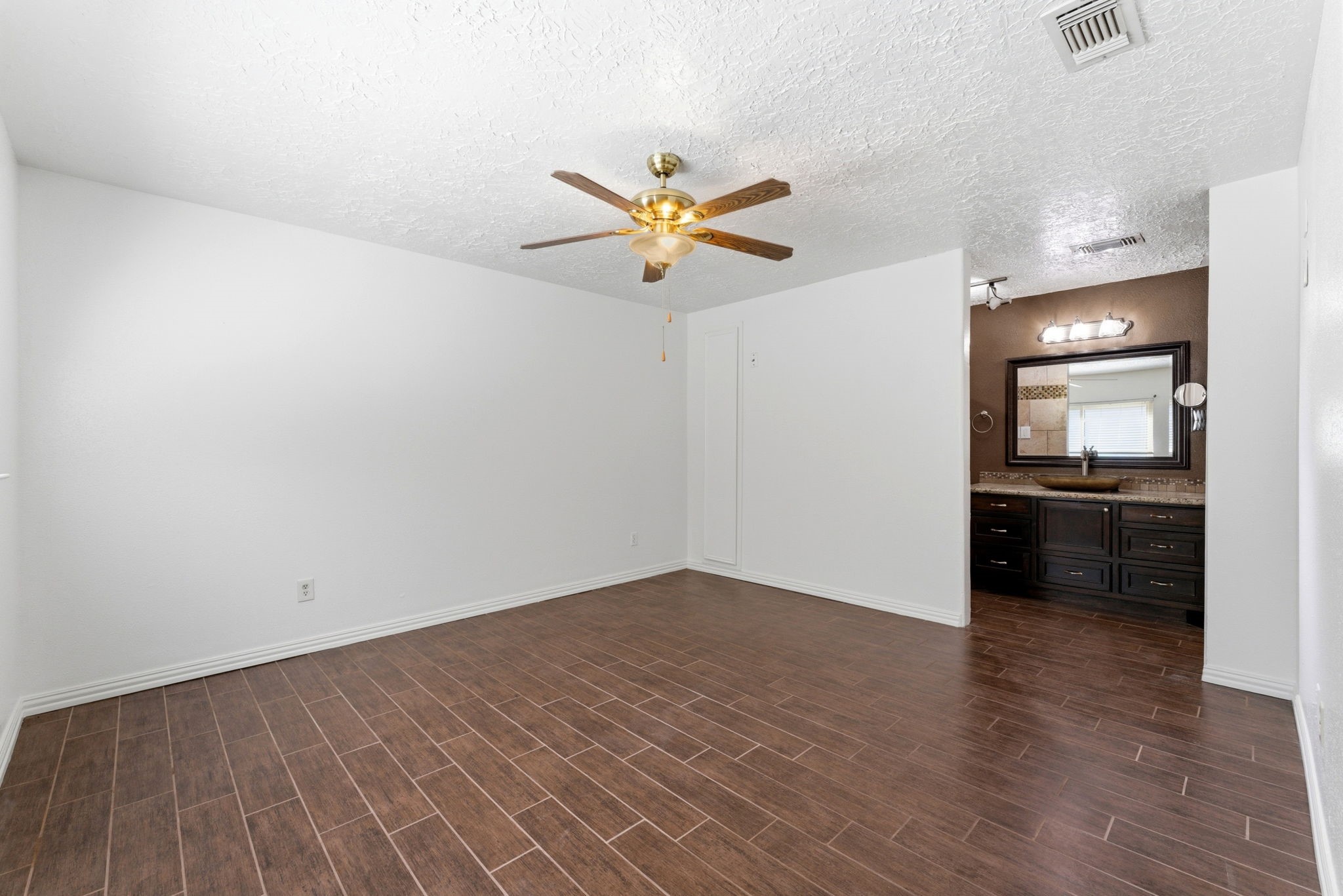 21514 Slippery Creek Lane Spring, TX 77388 - Photo 14 of 27 wooden floor in an empty room