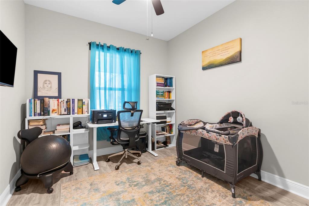 9347 North Star Court Weeki Wachee, FL 34613 - Photo 25 of 46 a workspace with furniture and window