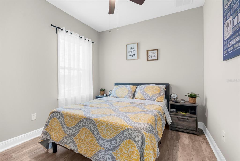 9347 North Star Court Weeki Wachee, FL 34613 - Photo 28 of 46 a bedroom with a bed and a window