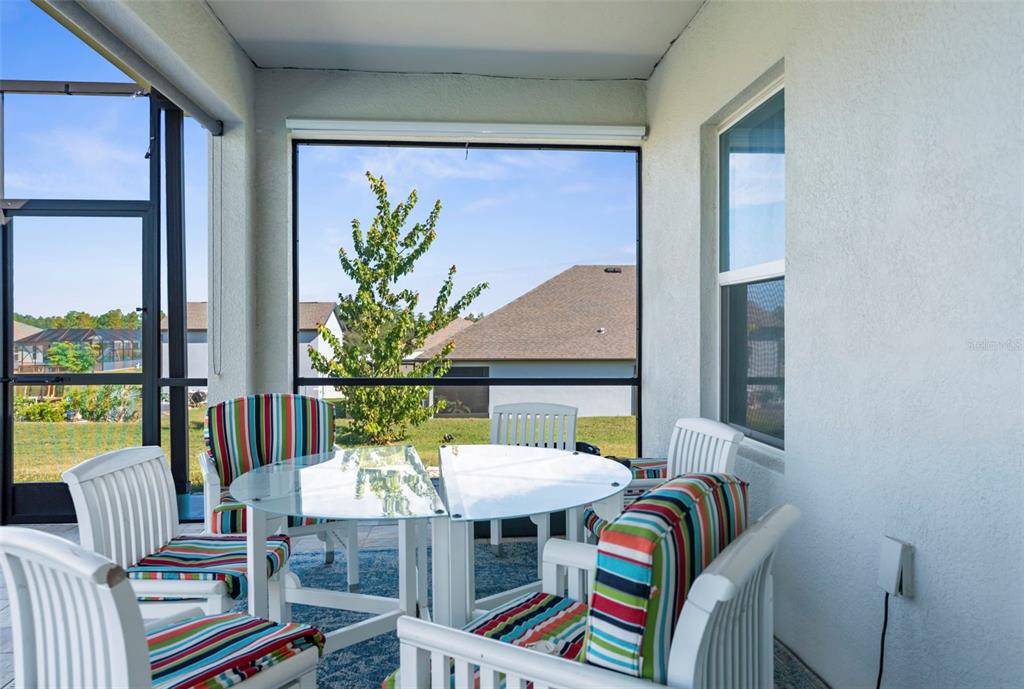 9347 North Star Court Weeki Wachee, FL 34613 - Photo 32 of 46 a view of a dining room with furniture window and outside view