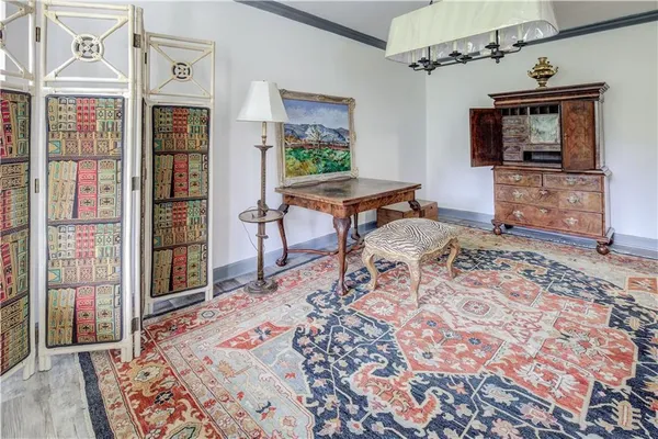 a living room with a couch and a flat screen tv