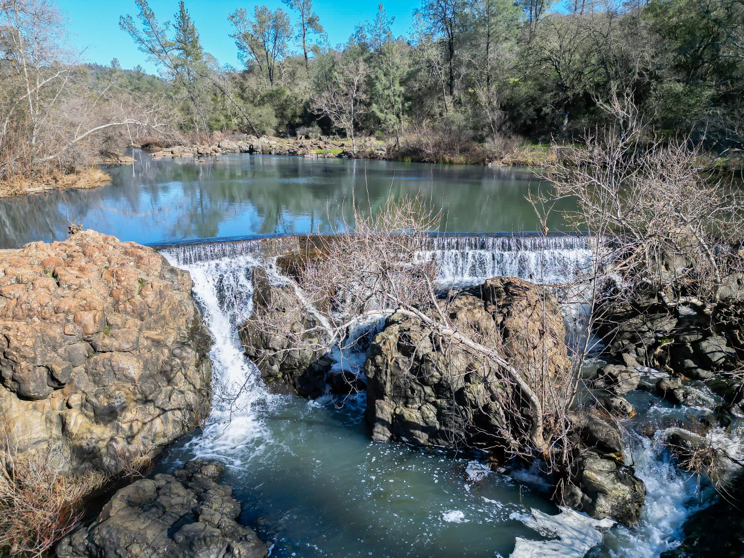 0 Scott Forbes Road Browns Valley, CA 95918 - Photo 55 of 78 a view of a large body of water surrounded by trees