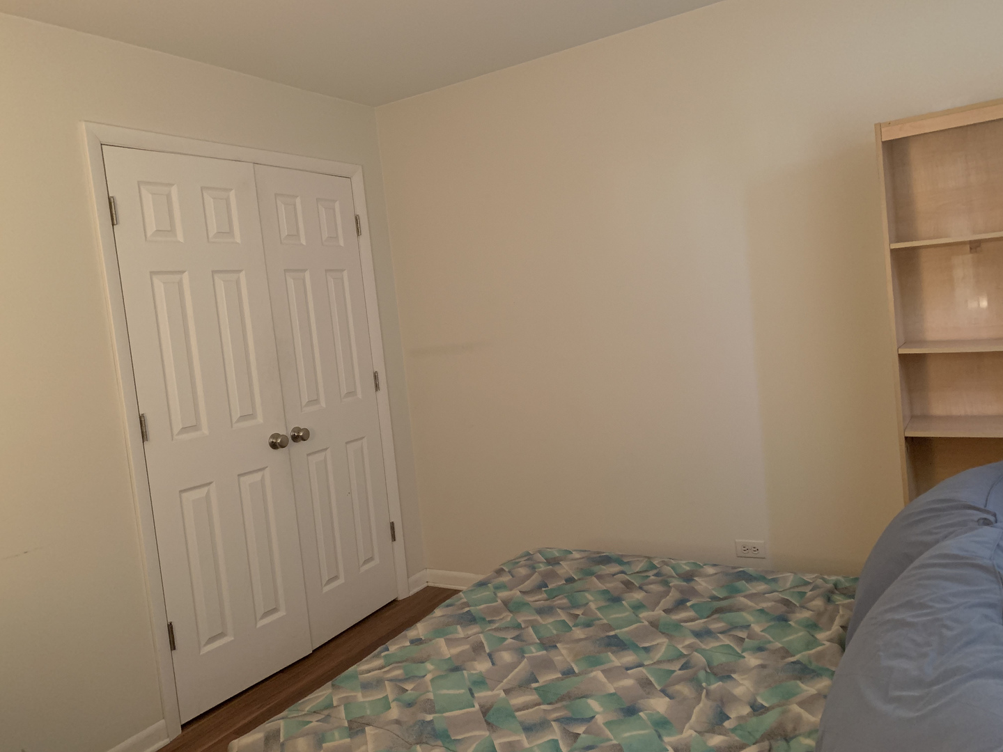 7755 South Roberts Road, Unit 2 Bridgeview, IL 60455 - Photo 12 of 13 a view of a bedroom with wooden floor and closet