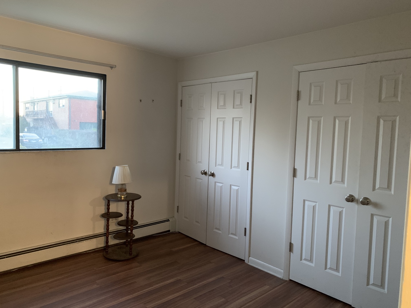 7755 South Roberts Road, Unit 2 Bridgeview, IL 60455 - Photo 8 of 13 a view of a livingroom with furniture and wooden floor