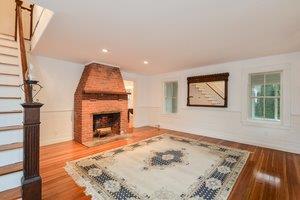 87 Tahanto Road Pocasset, MA 02559 - Photo 14 of 29 a view of a livingroom with a fireplace
