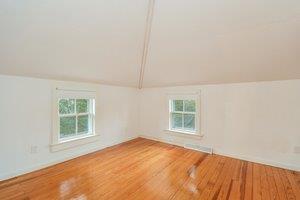 87 Tahanto Road Pocasset, MA 02559 - Photo 25 of 29 an empty room with a window