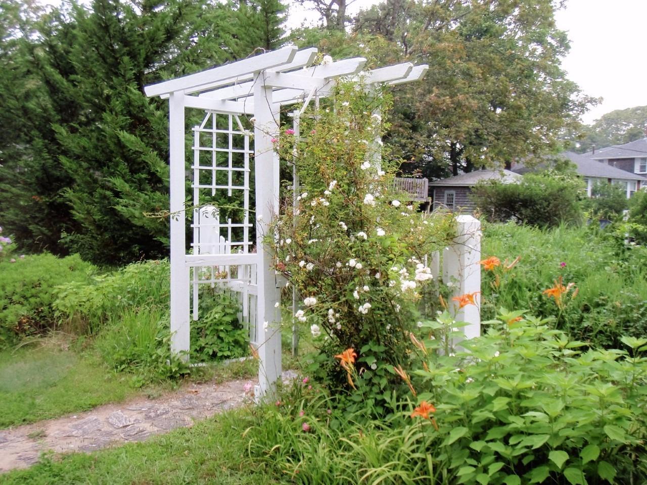 87 Tahanto Road Pocasset, MA 02559 - Photo 8 of 29 a view of a house with a tree