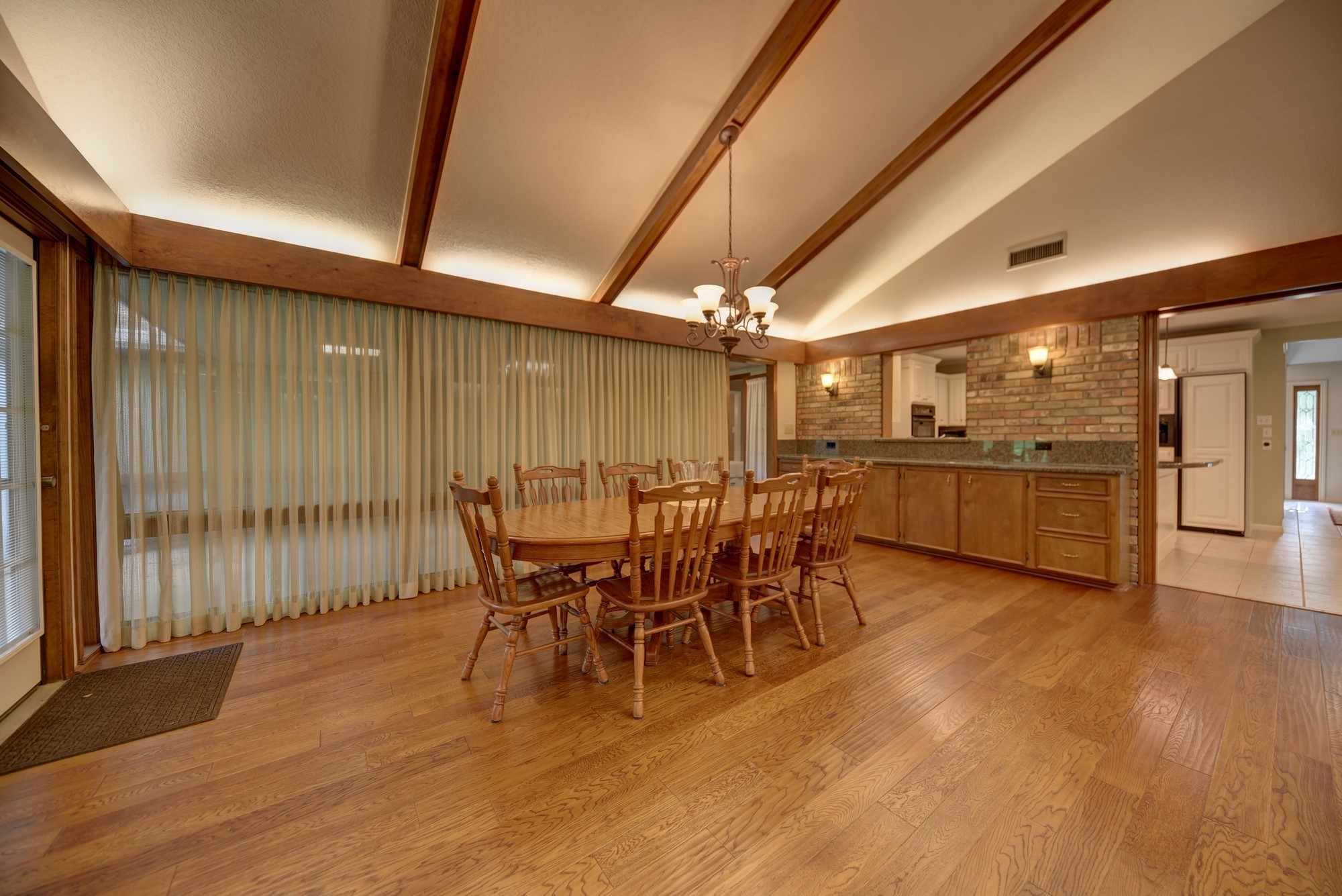 2502 Cheri Lane Brenham, TX 77833 - Photo 11 of 46 a view of a dining room with furniture window and wooden floor