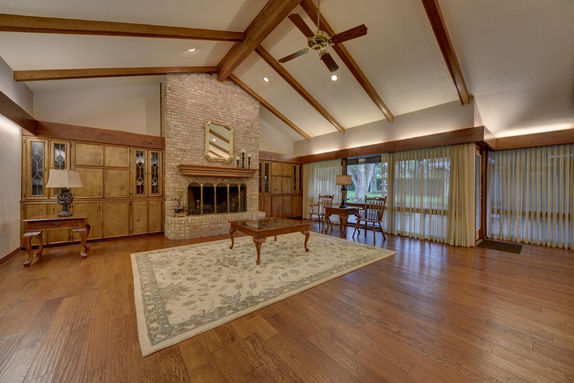 2502 Cheri Lane Brenham, TX 77833 - Photo 14 of 46 a living room with furniture and a fireplace