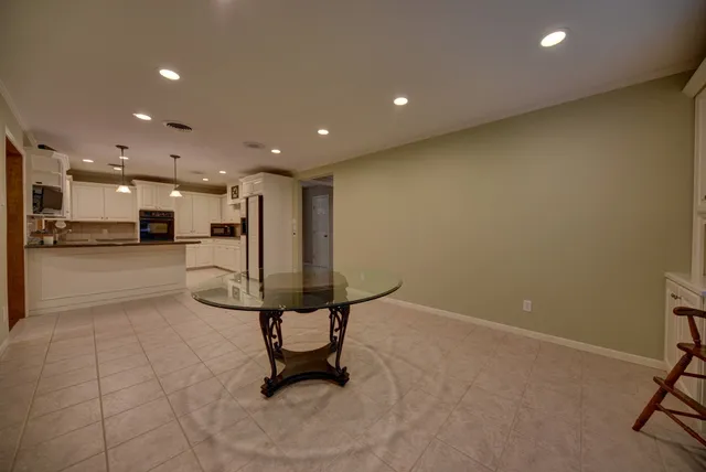 a view of a room with windows