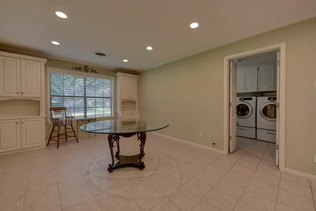 a living room with furniture window and fireplace