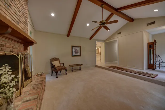 a view of a hall with wooden floor