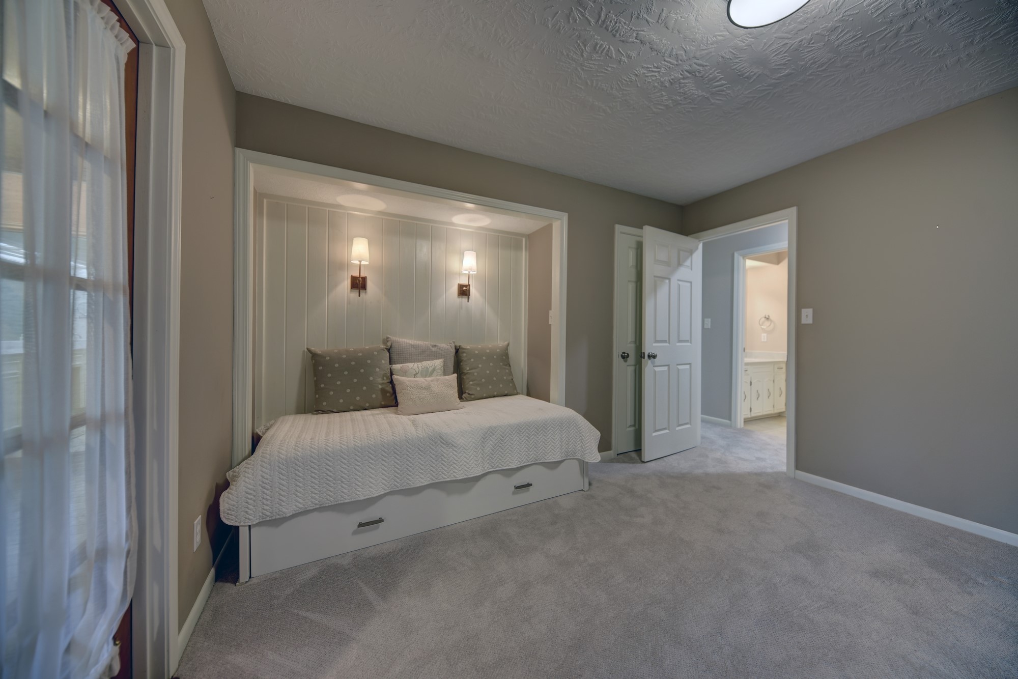 2502 Cheri Lane Brenham, TX 77833 - Photo 40 of 46 a spacious bedroom with a bed and a mirror