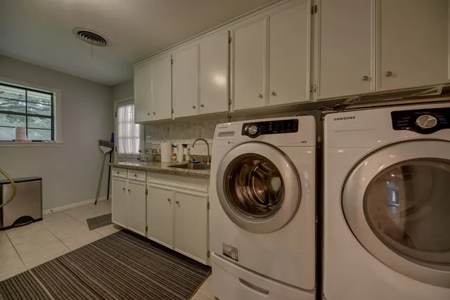 a backyard of a house with lots of green space