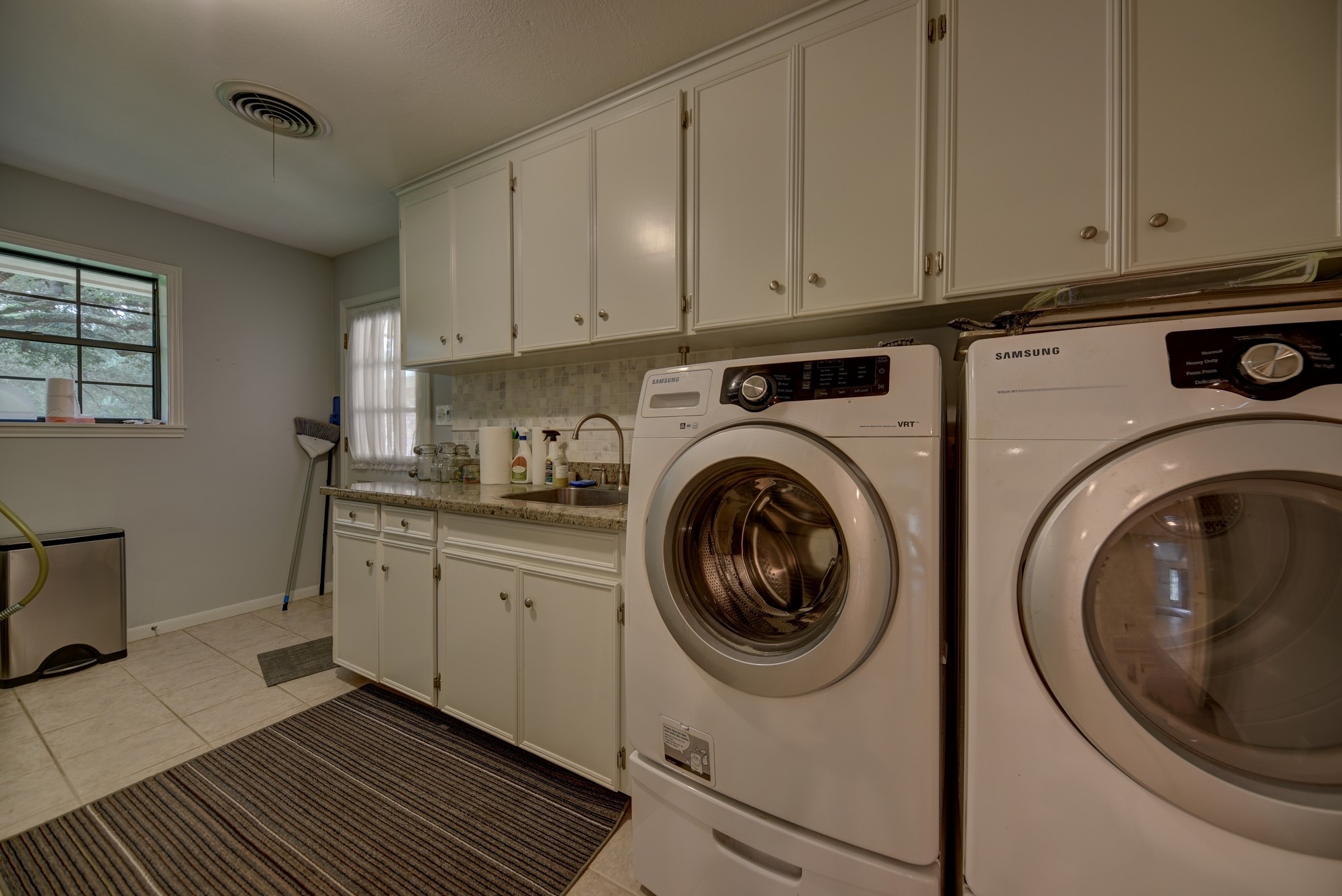 2502 Cheri Lane Brenham, TX 77833 - Photo 42 of 46 a utility room with sink dryer and washer