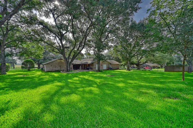 a view of a building with a yard