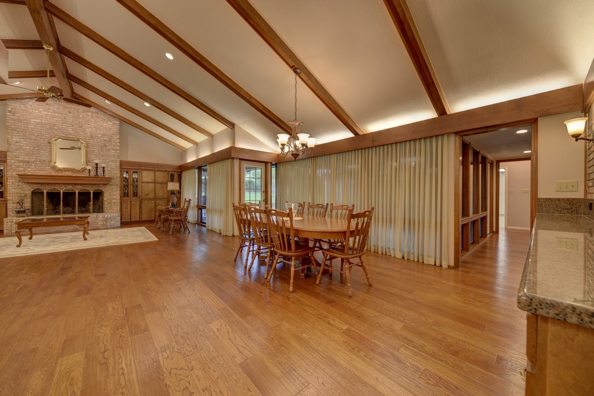 2502 Cheri Lane Brenham, TX 77833 - Photo 10 of 46 a view of a dining room with furniture window and wooden floor