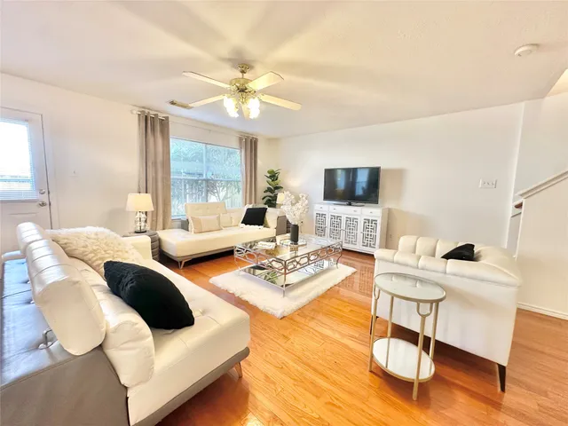 a kitchen with a stove top oven sink and cabinets