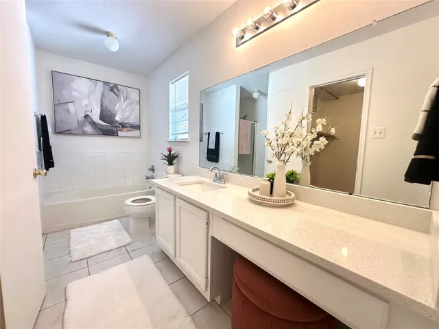 a view of a livingroom with furniture and window
