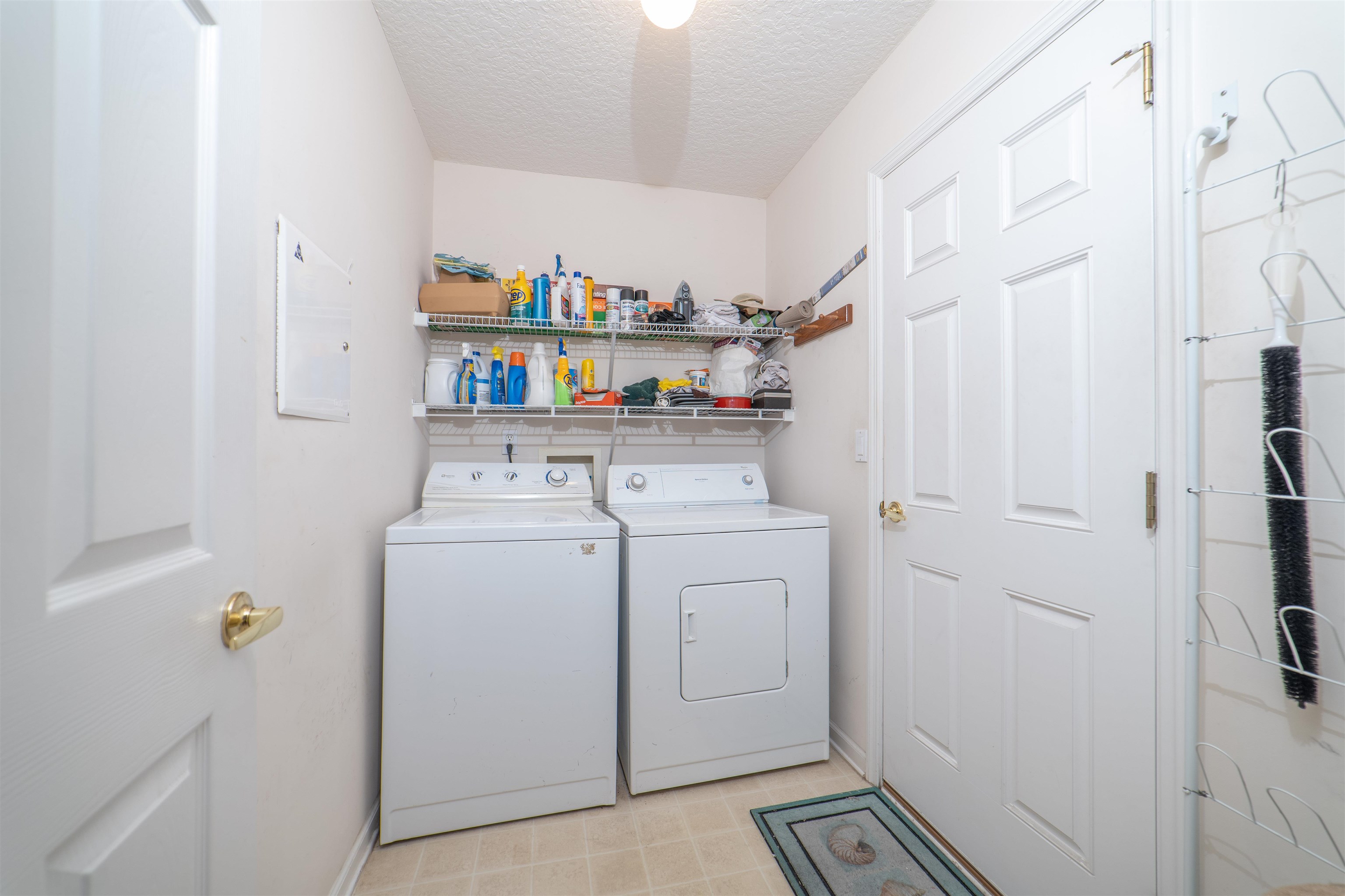 1853 Keswick Road St. Augustine, FL 32084 - Photo 22 of 27 a utility room with dryer and washer