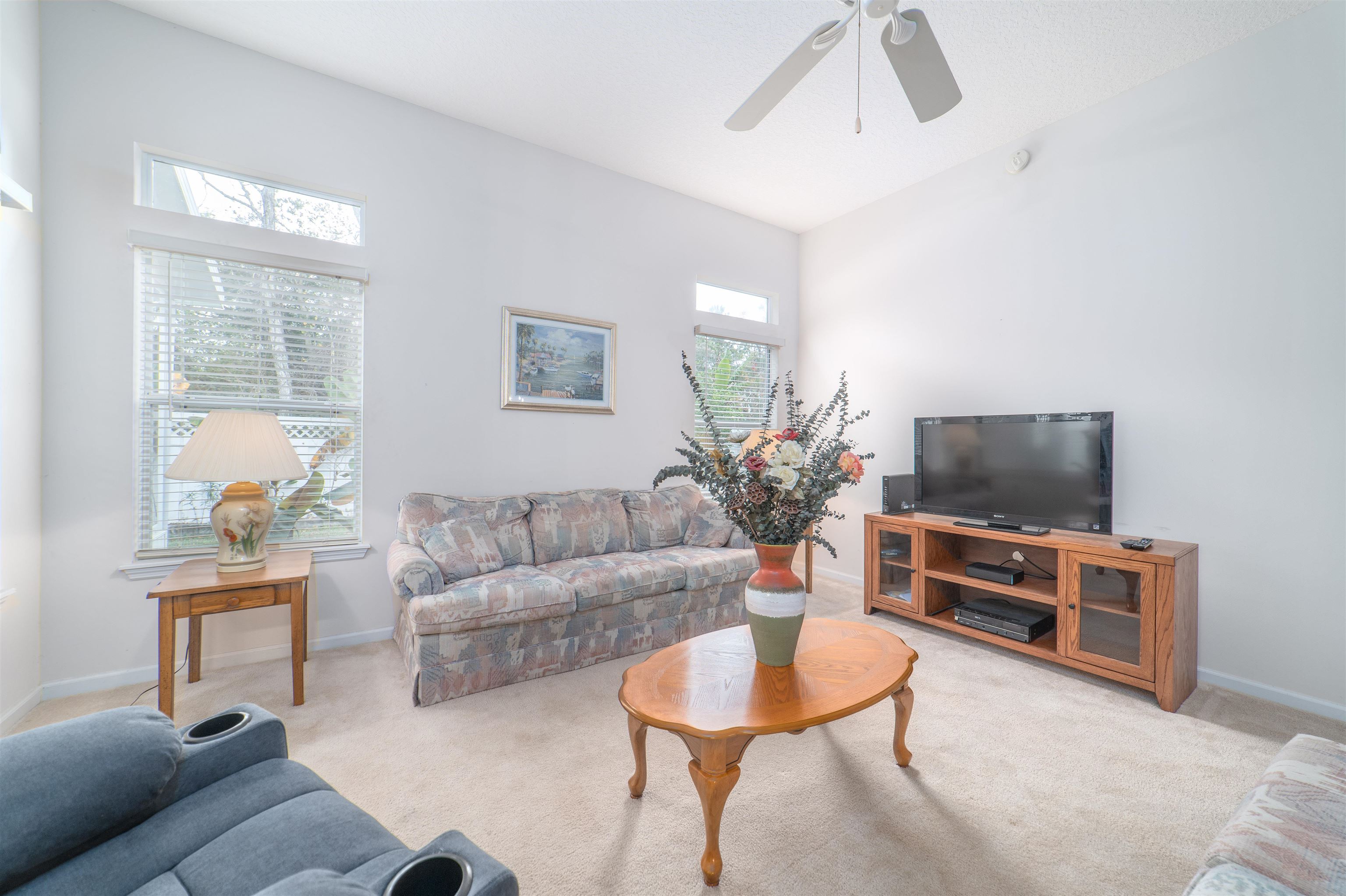 1853 Keswick Road St. Augustine, FL 32084 - Photo 8 of 27 a living room with furniture and a flat screen tv
