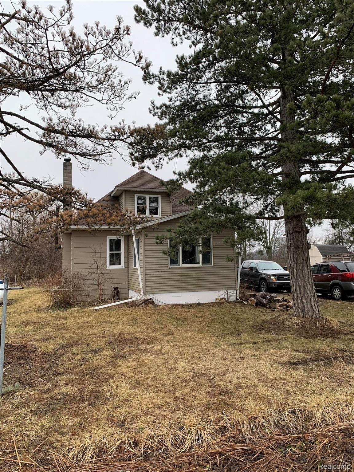 7078 Fargo Road Avoca, MI 48006 - Photo 2 of 41 Front of house that faces the road