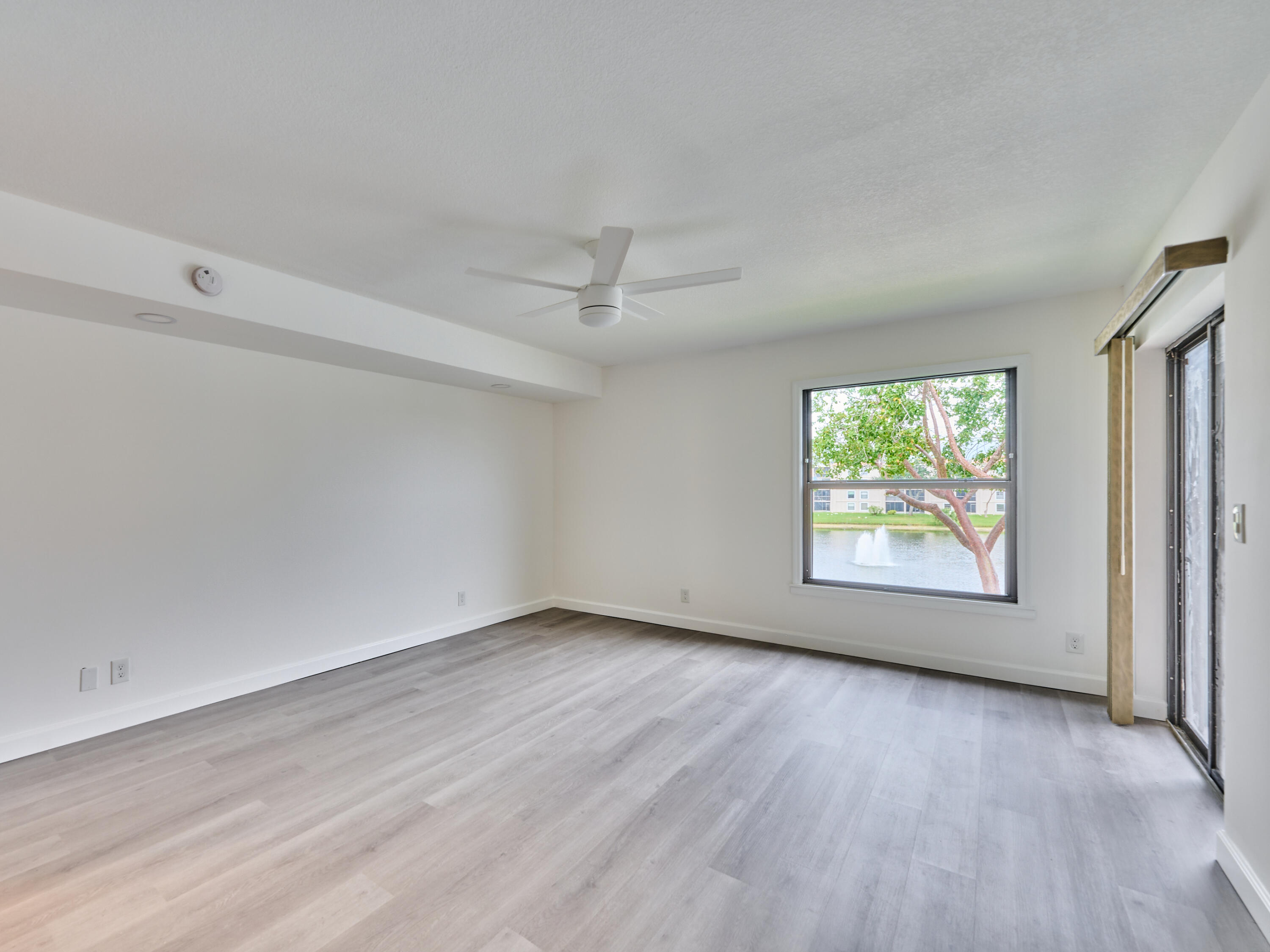 6193 Pointe Regal Circle, Unit 306 Delray Beach, FL 33484 - Photo 20 of 60 PRIMARY BEDROOM