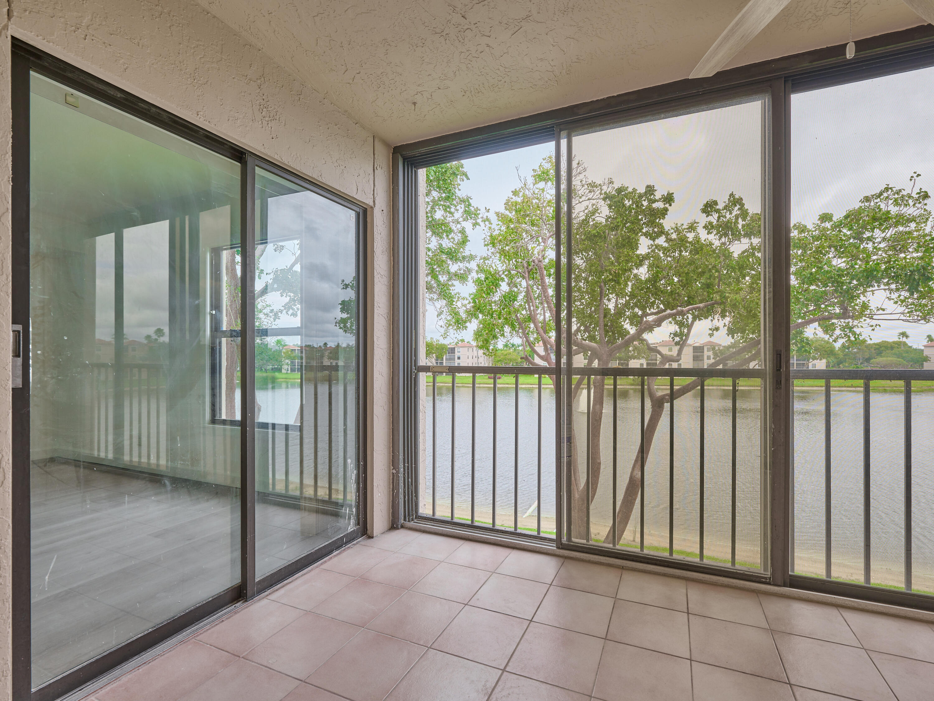 6193 Pointe Regal Circle, Unit 306 Delray Beach, FL 33484 - Photo 35 of 60 ENCLOSED PATIO
