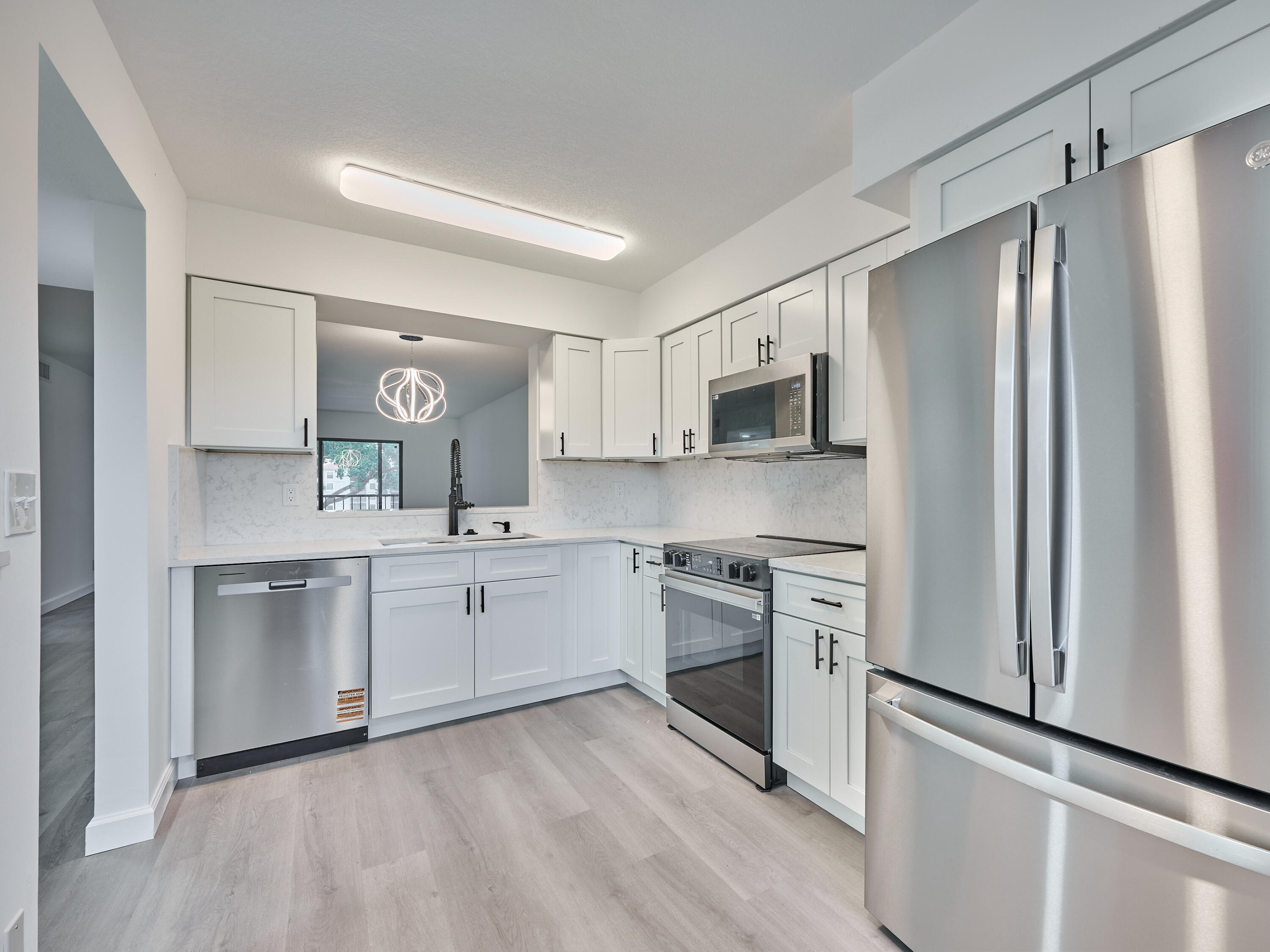 6193 Pointe Regal Circle, Unit 306 Delray Beach, FL 33484 - Photo 7 of 60 NEW KITCHEN & AOOLIANCES